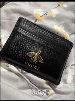 Gucci card holder men in excellent condition comes with original box and dustbag