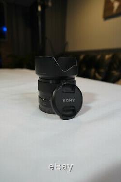 Sony SEL 35mm f/1.8 OSS Lens Original Box & Hood. Excellent Condition