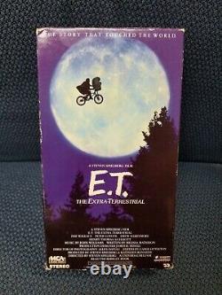 Original E T VHS 1982 ouvert mais en excellent état. Vert et noir.