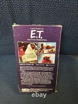 Original E T VHS 1982 ouvert mais en excellent état. Vert et noir.